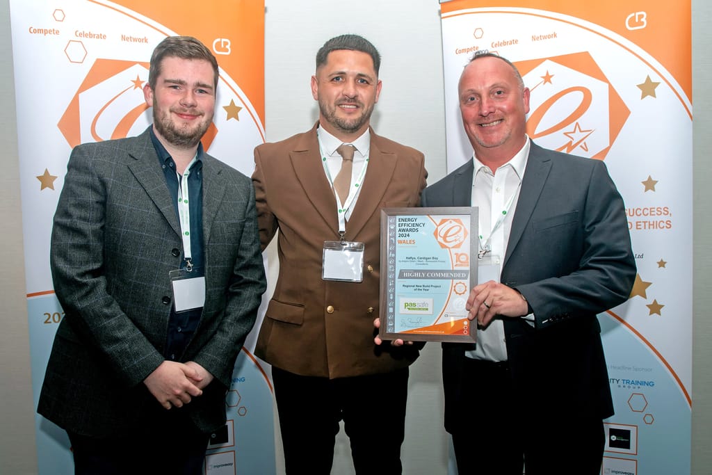 Josh and Damien accept their "Highly Commended Regional New Build" award at the Energy Efficiency Awards.